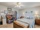 Bedroom with ample desk space, storage, and natural light from window at 1035 W 2Nd St, Mesa, AZ 85201