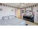 Bedroom featuring a ceiling fan, pink walls with black and white accents at 1035 W 2Nd St, Mesa, AZ 85201