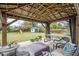 An inviting gazebo with comfortable seating creates a perfect outdoor relaxation spot with a large yard at 1035 W 2Nd St, Mesa, AZ 85201