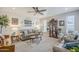 Bright living room featuring neutral tones, plush seating, decorative furnishings, and plenty of natural light at 1035 W 2Nd St, Mesa, AZ 85201