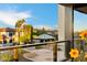 Balcony showcasing community views, potted flowers, and seating, perfect for relaxation at 1040 E Osborn Rd # 203, Phoenix, AZ 85014