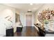 Stylish hallway featuring modern art, sleek console table, and neutral color palette at 1040 E Osborn Rd # 203, Phoenix, AZ 85014