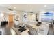 Stylish living room featuring a white sectional, modern artwork, and sleek design elements at 1040 E Osborn Rd # 203, Phoenix, AZ 85014