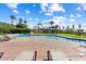 Enjoy the community pool, lounge chairs, and gorgeous landscaping at 1040 E Osborn Rd # 203, Phoenix, AZ 85014