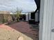 Paver patio and shed with an AC unit in the backyard of the home, ideal for outdoor living at 10951 N 91St Ave # 206, Peoria, AZ 85345