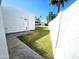 View of backyard with grass and cement walkway at 11221 N 32Nd St, Phoenix, AZ 85028