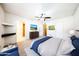 Calm main bedroom with a ceiling fan, dresser, and ensuite bathroom access at 11221 N 32Nd St, Phoenix, AZ 85028