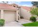 Exterior of home with garage, stairs to front door, and desert landscaping at 11515 N 91St St # 142, Scottsdale, AZ 85260