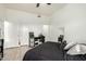 Spacious bedroom featuring a bed, desk, and ample closet space at 11779 E Becker Ln, Scottsdale, AZ 85259