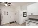 Bright kitchen with stainless steel appliances, stone countertops, and plenty of storage at 11779 E Becker Ln, Scottsdale, AZ 85259