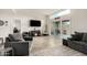 Inviting living room with sliding glass doors leading to the outdoor patio, perfect for entertaining at 11779 E Becker Ln, Scottsdale, AZ 85259