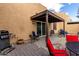 Charming patio with barbecue, paved area and outdoor seating, perfect for enjoying the outdoors at 11779 E Becker Ln, Scottsdale, AZ 85259