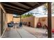 Enclosed patio with a mix of seating arrangements, perfect for entertaining and relaxing at 11779 E Becker Ln, Scottsdale, AZ 85259