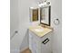 Bathroom featuring a vanity with a sink, mirror, and vanity lights. Includes towel racks at 12037 S Bannock St, Phoenix, AZ 85044