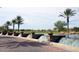 Upscale community entrance features a waterfall and lush landscaping at 12572 W Jasmine Trl, Peoria, AZ 85383