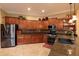 Kitchen with stainless steel appliances, granite countertops, and mosaic backsplash at 12572 W Jasmine Trl, Peoria, AZ 85383