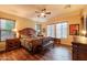 Main bedroom features hardwood floors, natural light, and stylish decor at 12572 W Jasmine Trl, Peoria, AZ 85383