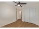 Charming bedroom with modern floors and closet space at 14838 N 172Nd Ln, Surprise, AZ 85388