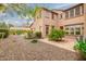 Lovely backyard featuring rock landscaping and a beautiful patio at 15289 W Valentine St, Surprise, AZ 85379