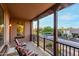 Relaxing balcony view featuring outdoor seating and neighborhood scenery at 15289 W Valentine St, Surprise, AZ 85379