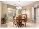 Cozy breakfast nook with a dining table and chairs next to a window, perfect for meals at 15289 W Valentine St, Surprise, AZ 85379