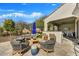 Beautiful backyard featuring an outdoor kitchen, bar, and seating, ideal for entertaining guests or relaxing at 16987 W Princeton Ave, Goodyear, AZ 85395