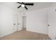 This is a light and bright bedroom with a ceiling fan and neutral flooring at 1810 N 12Th St, Phoenix, AZ 85006