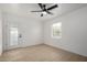 Bright bedroom with neutral flooring, plenty of light and an exterior door at 1810 N 12Th St, Phoenix, AZ 85006