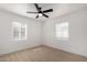 Bright bedroom with neutral flooring and modern ceiling fan at 1810 N 12Th St, Phoenix, AZ 85006