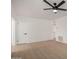 Spacious room with neutral walls, light wood flooring, and ceiling fan at 1810 N 12Th St, Phoenix, AZ 85006