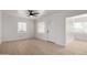 Bright living room with light wood floors, white walls, and lots of natural light at 1810 N 12Th St, Phoenix, AZ 85006