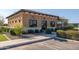 Exterior view of the community art studio, showcasing its welcoming facade and surrounding greenery at 18182 W Glenhaven Dr, Goodyear, AZ 85338