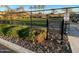 Community dog park featuring lush landscaping, a secure fence, and ample space for recreational activities at 18182 W Glenhaven Dr, Goodyear, AZ 85338