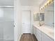 Bright bathroom with a glass-enclosed shower and a double sink vanity at 1940 W Oriole Way, Chandler, AZ 85286