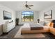 Cozy bedroom with a large window offering scenic views and a contemporary design at 1940 W Oriole Way, Chandler, AZ 85286