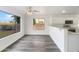 Open-concept dining area with a view of kitchen and backyard at 1940 W Oriole Way, Chandler, AZ 85286