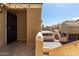 Comfortable outdoor patio offering a glimpse of nearby units in a well-maintained complex at 2035 S Elm St # 218, Tempe, AZ 85282