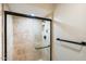 Modern walk-in shower featuring sleek glass doors, tile surround, and contemporary fixtures at 25515 N Forest N Rd # 2, Rio Verde, AZ 85263