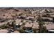 Expansive aerial view of desert community, showcasing neighborhood and surrounding mountain landscape at 3020 E Rockledge Rd, Phoenix, AZ 85048