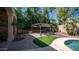 Backyard showcasing a pergola and pool, perfect for outdoor enjoyment at 3020 E Rockledge Rd, Phoenix, AZ 85048