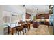 Well-lit kitchen with cherry-wood cabinets, granite counters, a center island, and stainless steel appliances at 3020 E Rockledge Rd, Phoenix, AZ 85048