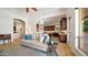 Spacious living room flowing into the kitchen with modern decor and natural light at 3020 E Rockledge Rd, Phoenix, AZ 85048