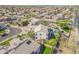 Back of house aerial view highlighting the patio, yard and the surrounding neighborhood at 3524 E Derringer Way, Gilbert, AZ 85297