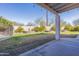 A backyard with decorative block wall and covered patio at 3524 E Derringer Way, Gilbert, AZ 85297