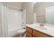 Bathroom featuring a shower and bath, mirror and vanity with a sink at 3524 E Derringer Way, Gilbert, AZ 85297