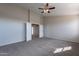 Large bedroom with plush carpeting and ample closet space providing comfort and practical storage solutions at 3524 E Derringer Way, Gilbert, AZ 85297