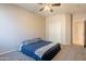 Bedroom featuring carpeted floor, closet with white doors, and ceiling fan at 3524 E Derringer Way, Gilbert, AZ 85297