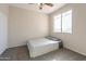 Cozy bedroom with neutral walls, carpet and a bright window at 3524 E Derringer Way, Gilbert, AZ 85297