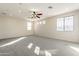 Large, carpeted bonus room featuring recessed lighting, a ceiling fan, and multiple bright windows at 3524 E Derringer Way, Gilbert, AZ 85297