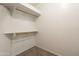 This walk-in closet with basic features awaits customization and organization at 3524 E Derringer Way, Gilbert, AZ 85297